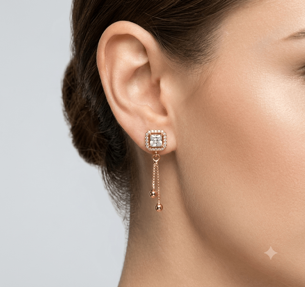 A very beautiful rose gold color ad collection earring sets usable for girls and womens