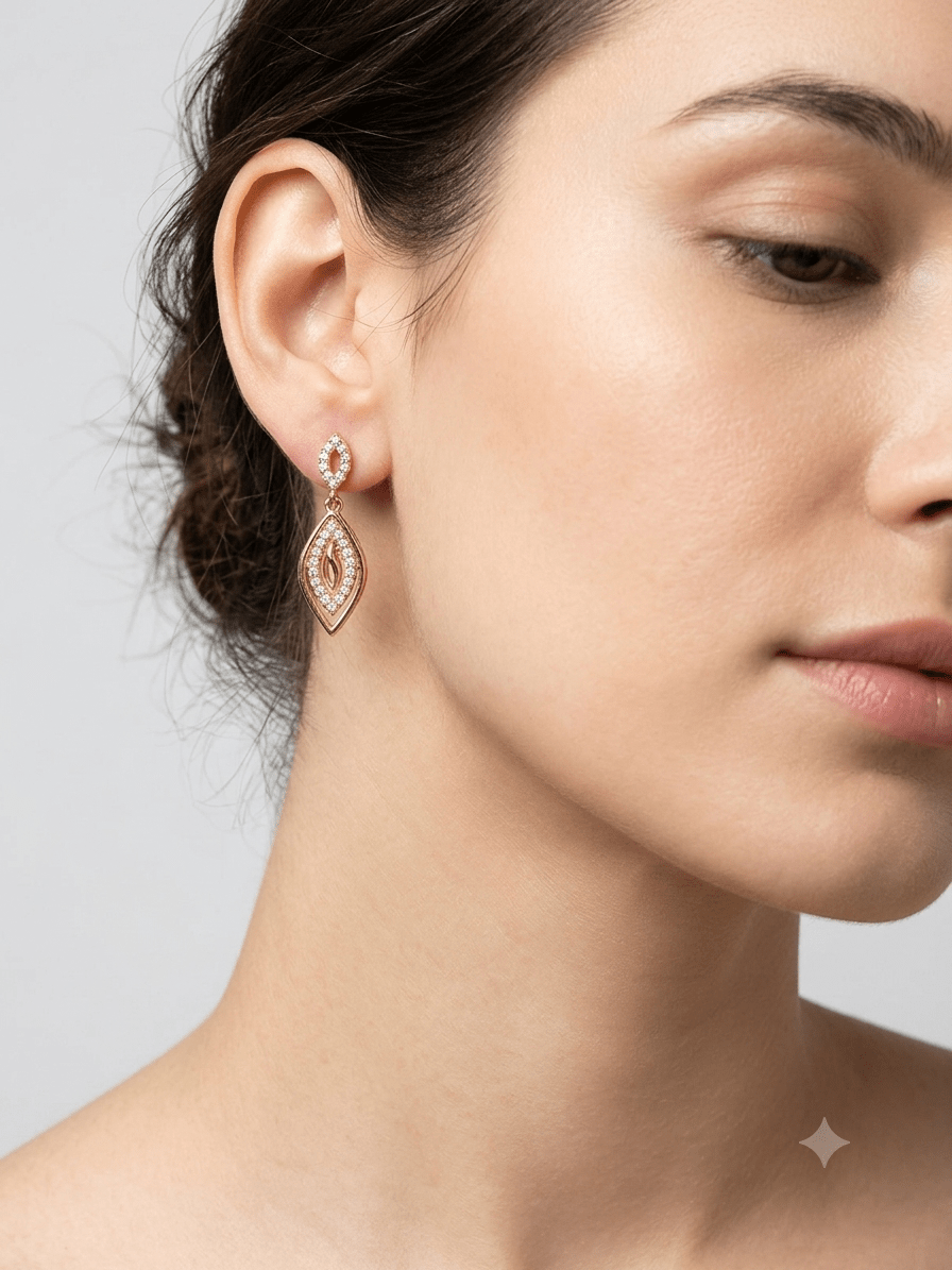 A very beautiful rose gold color ad collection earring sets usable for girls and womens