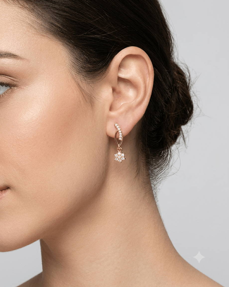 A very beautiful rose gold color ad collection earring sets usable for girls and womens