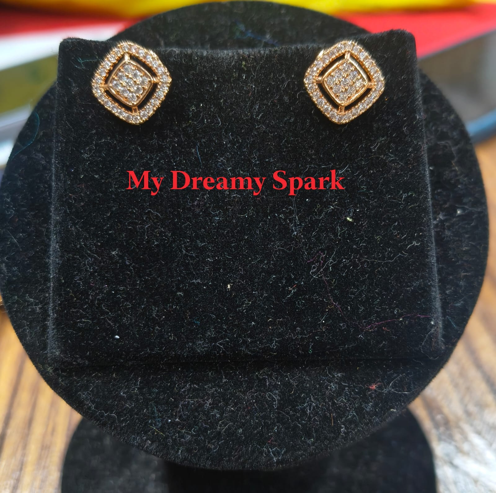 A very beautiful rose gold color ad collection earring sets usable for girls and womens