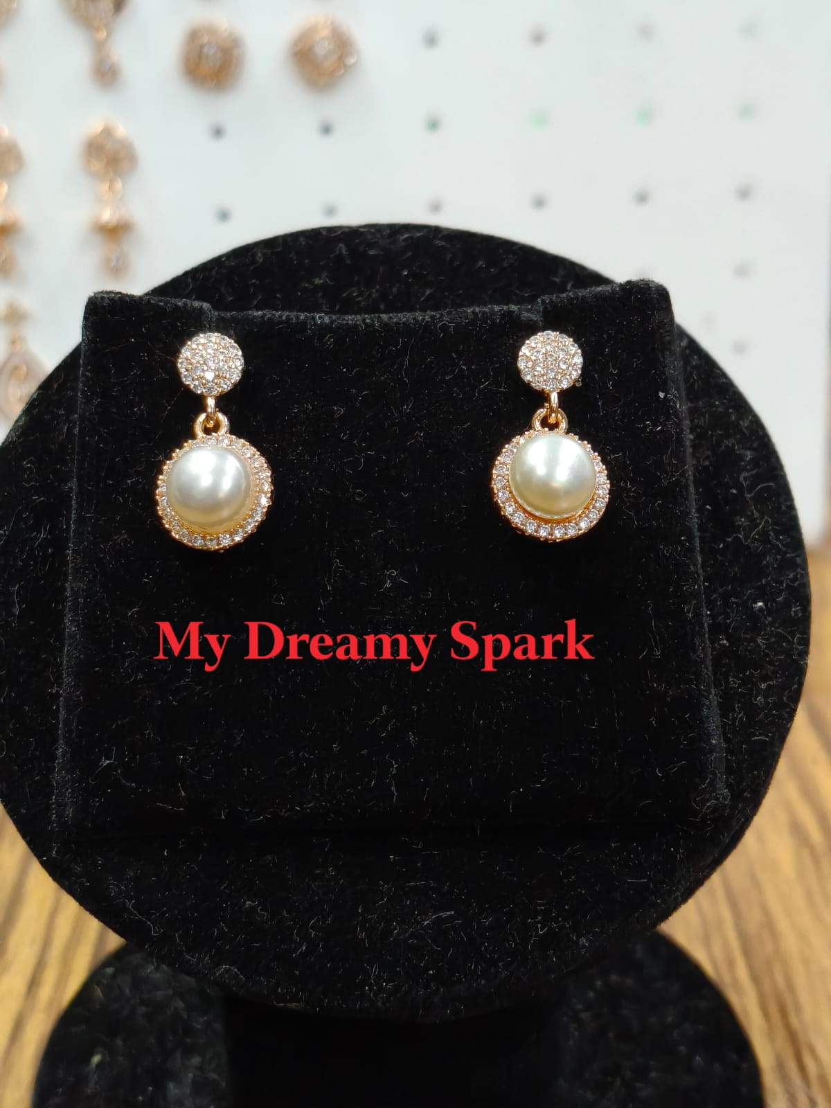 A very beautiful rose gold color ad collection earring sets usable for girls and womens