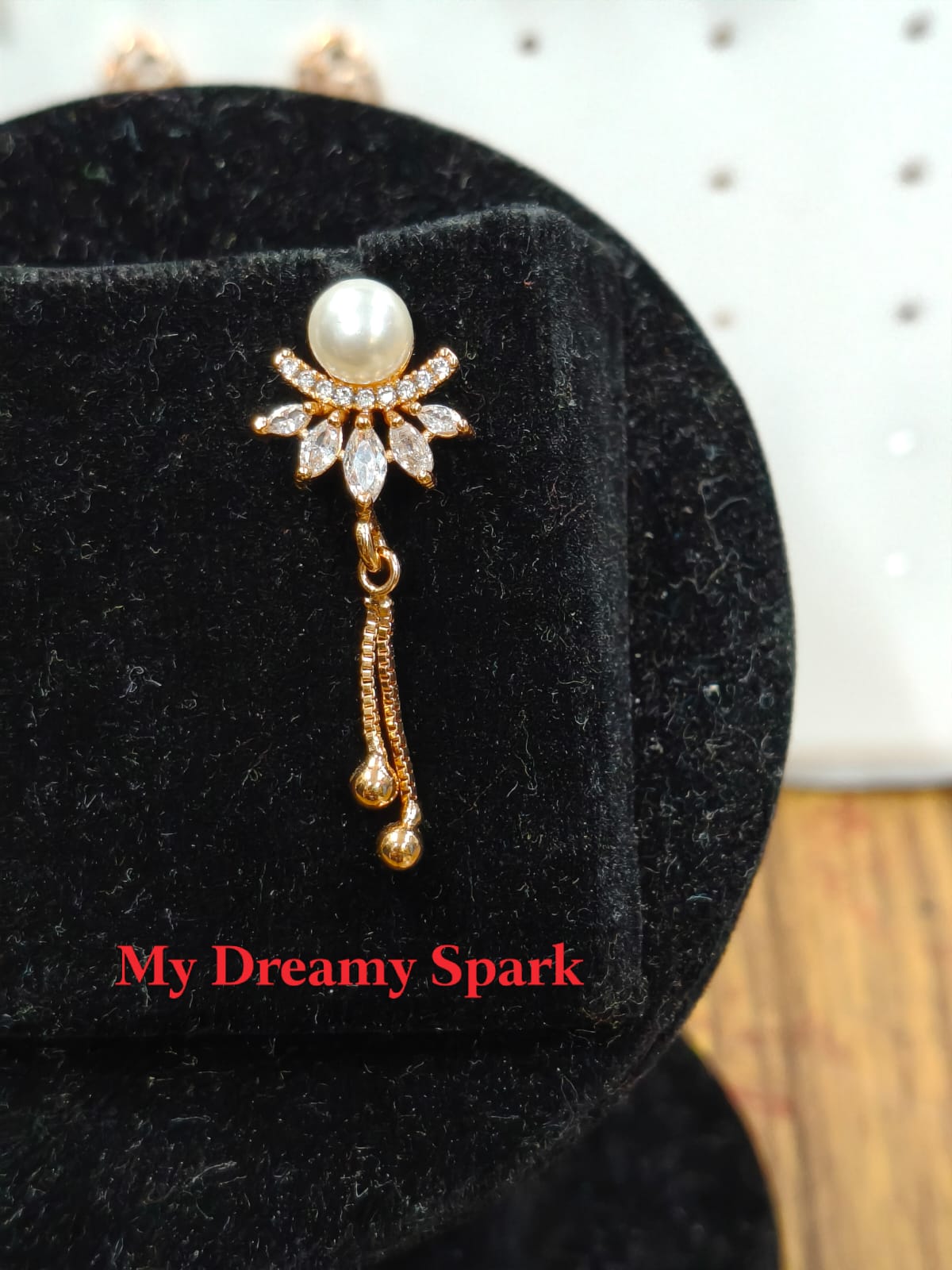 A very beautiful rose gold color ad collection earring sets usable for girls and womens