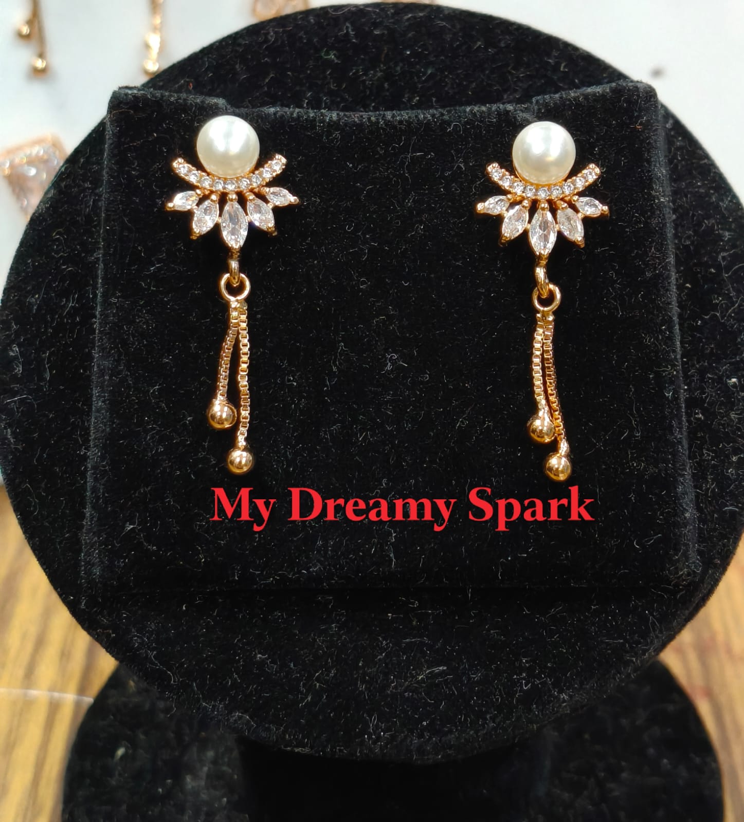 A very beautiful rose gold color ad collection earring sets usable for girls and womens