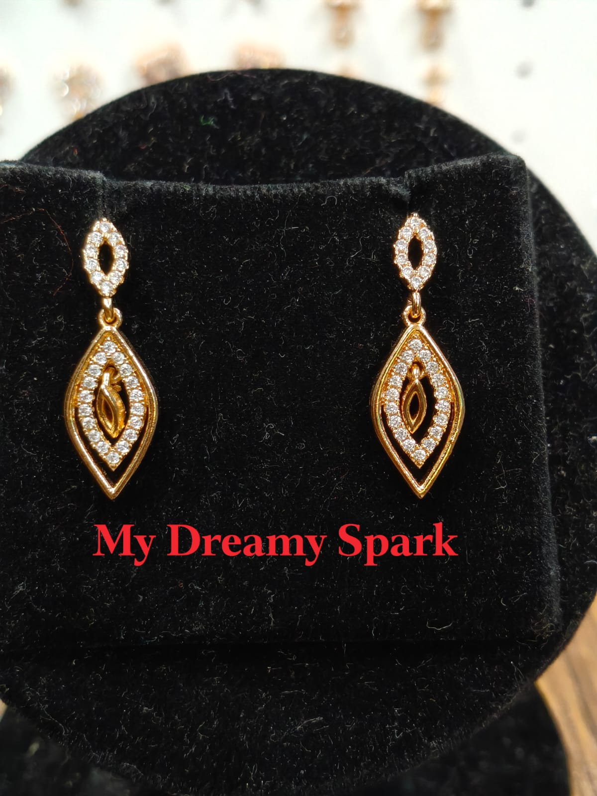 A very beautiful rose gold color ad collection earring sets usable for girls and womens