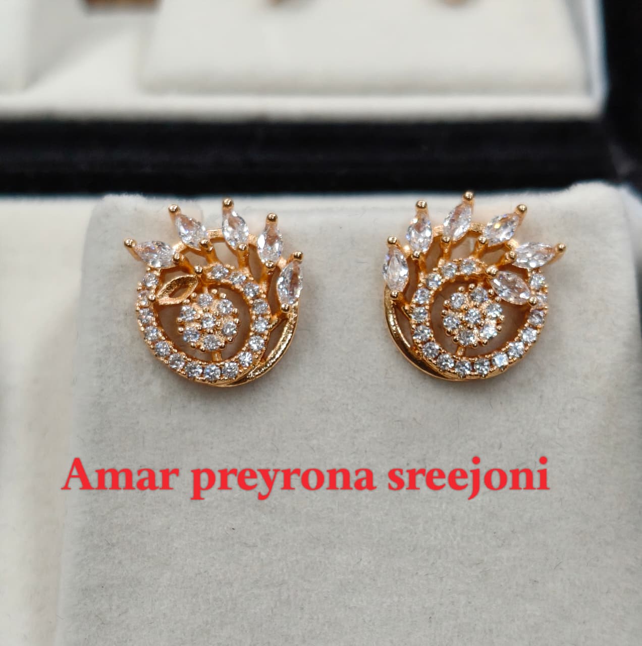A very beautiful rose gold color ad collection earring sets usable for girls and womens