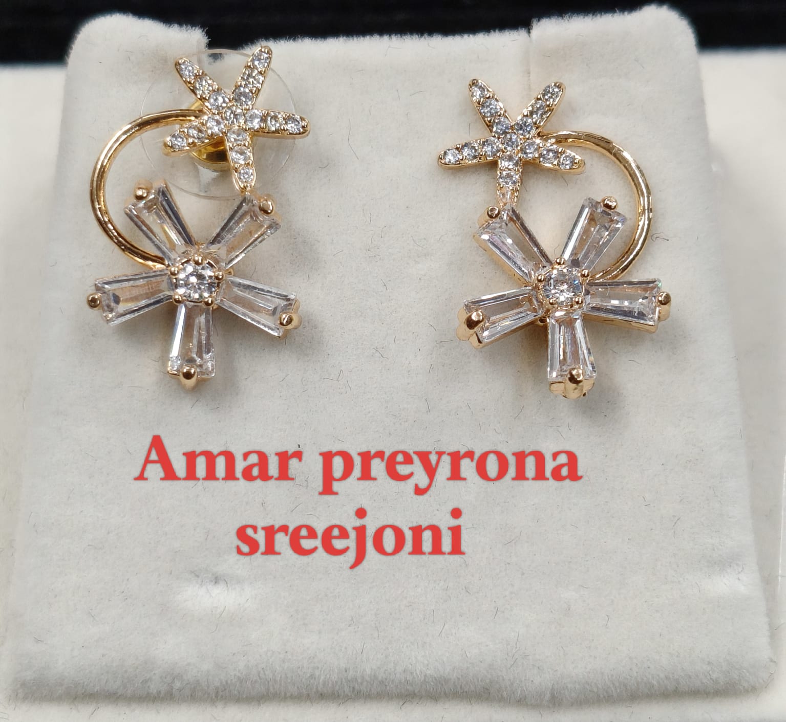 A very beautiful rose gold color ad collection earring sets usable for girls and womens