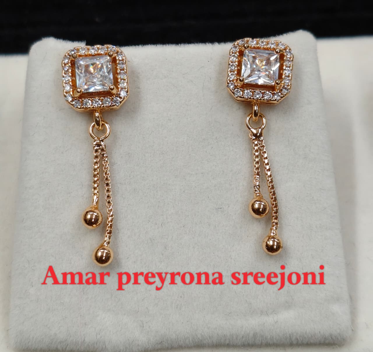 A very beautiful rose gold color ad collection earring sets usable for girls and womens