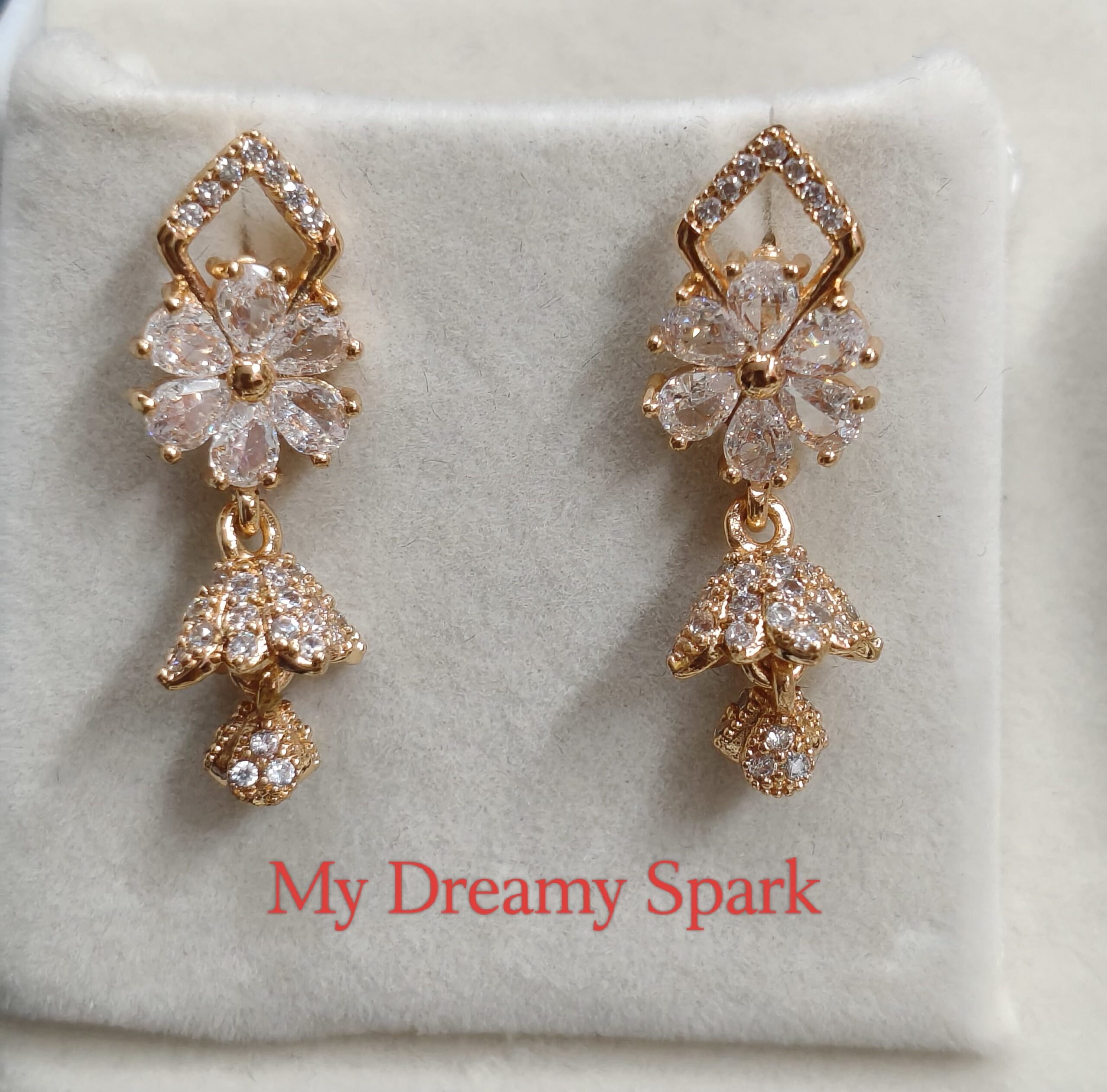 A very beautiful rose gold color ad collection earring sets usable for girls and womens