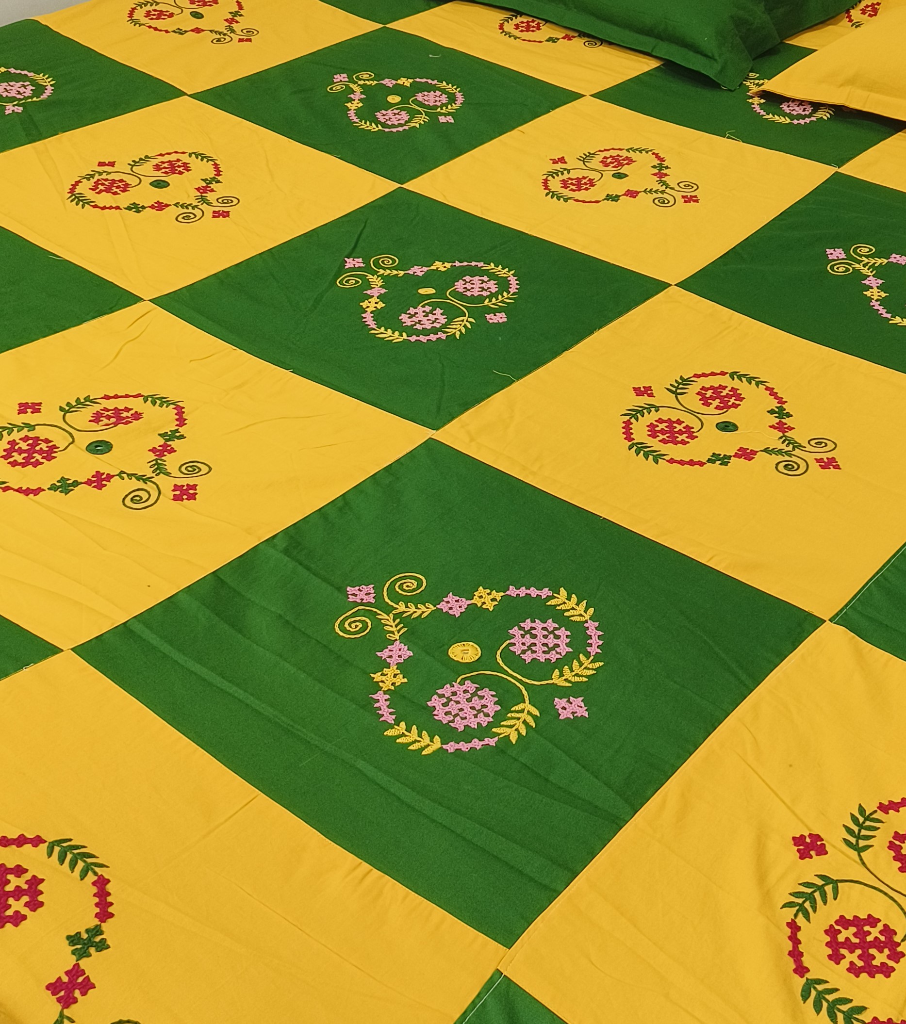 Hand embroided pure cotton yellow and green colour combination king size bedsheet