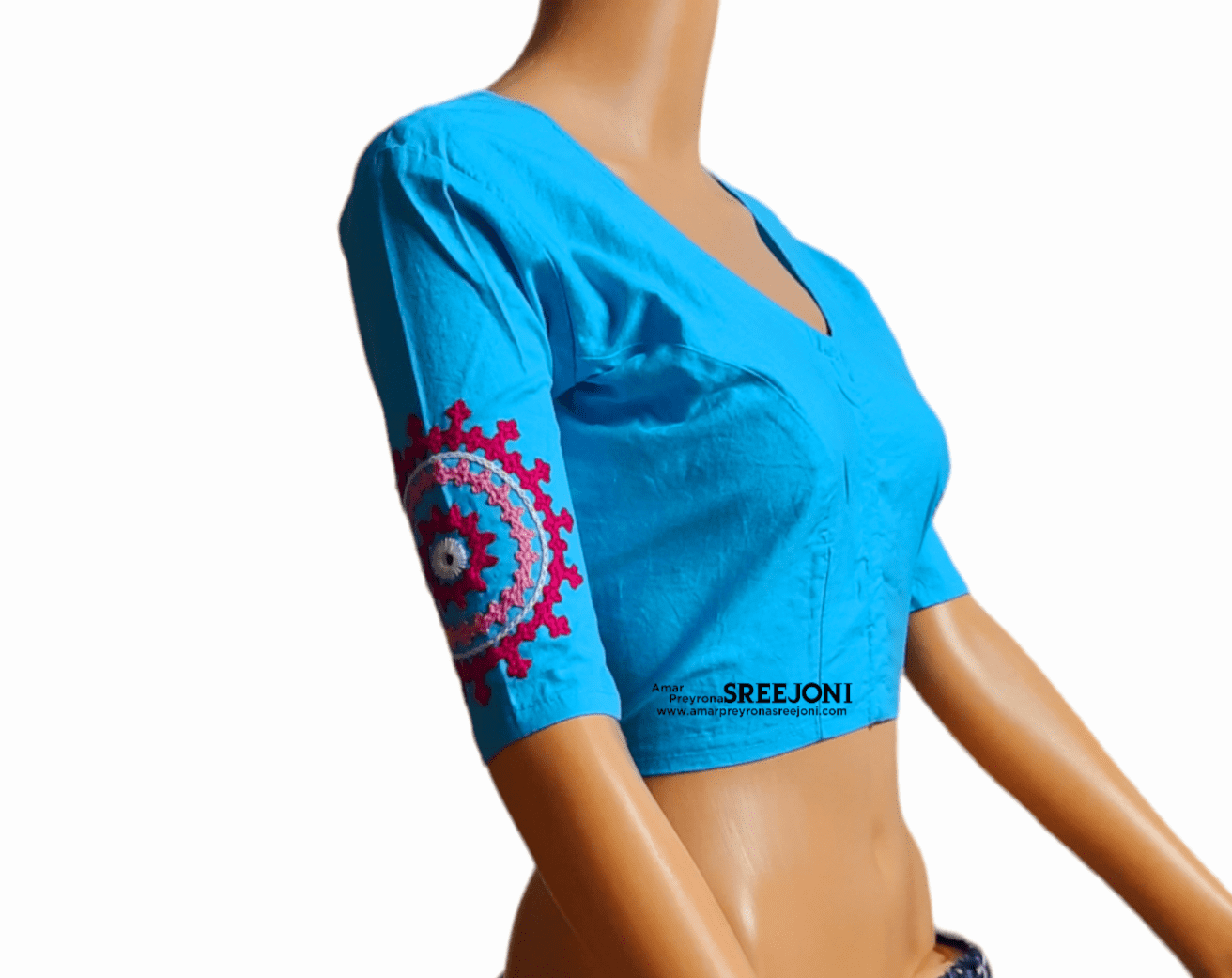 A very beautiful hand embroided pure cotton v-neck  blue color blouse